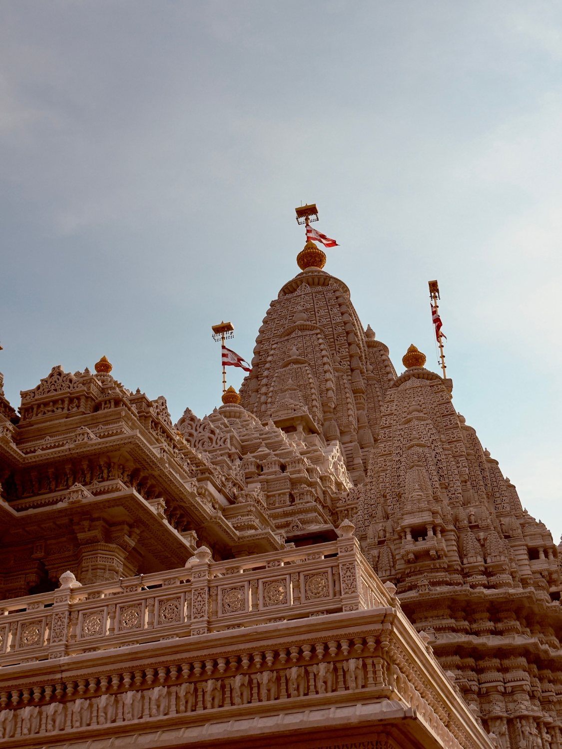 A carved temple in warm evening light