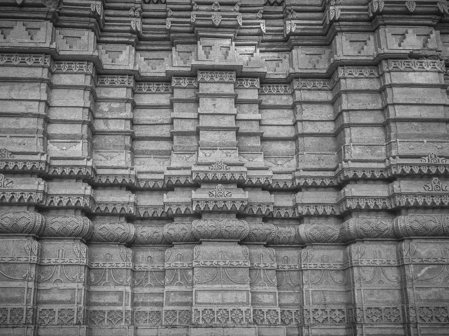 Courses of carved wall, photographed in black and white